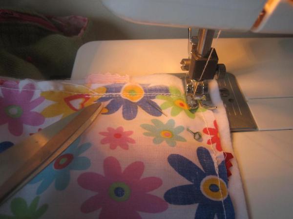 Stitching the two pieces of fabric together ~ start at one ribbon
